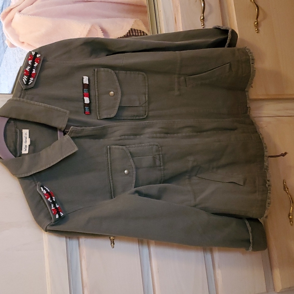Jacket, cotton Indigo thread company. Size Medium.